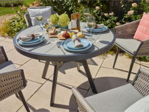bramblecrest mauritius 110cm round dining table with 4 chairs parasol base X23AMA110RT lifestyle 4