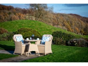 bramblecrest monterey 80cm bistro table with 2 armchairs sandstone X21WSMO80RD1 lifestyle 7