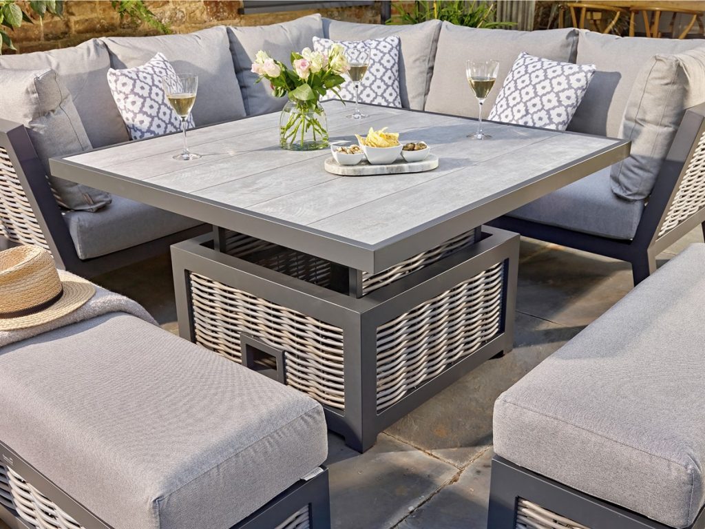 bramblecrest tuscan wicker corner sofa with square dual height table and 2 benches X21ATUSCDTJ1 lifestyle 2