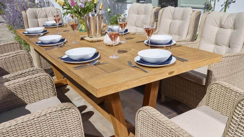 bramblecrest kuta 240cm rectangle table with 8 chedworth dining chairs sandstone X20TKU240RT9 lifestyle 3